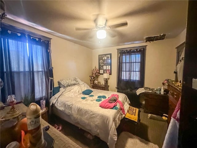 bedroom featuring ceiling fan