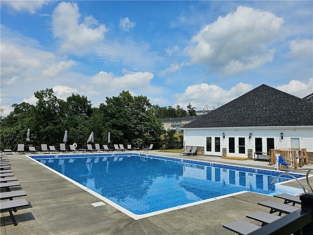 view of pool featuring a patio