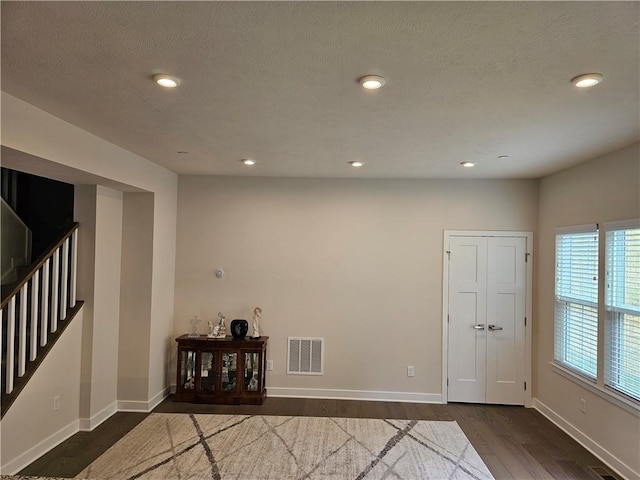 interior space featuring dark hardwood / wood-style flooring