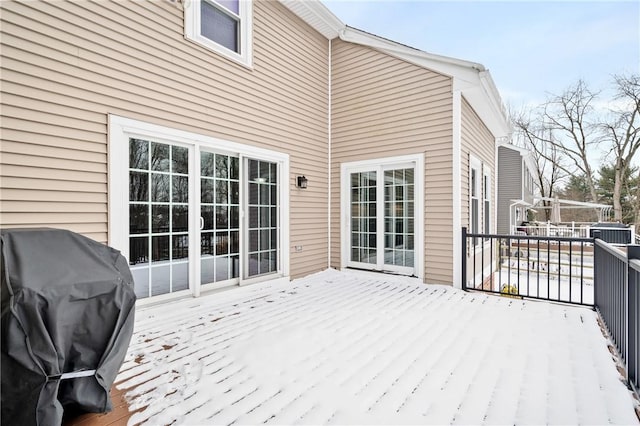 wooden deck with area for grilling