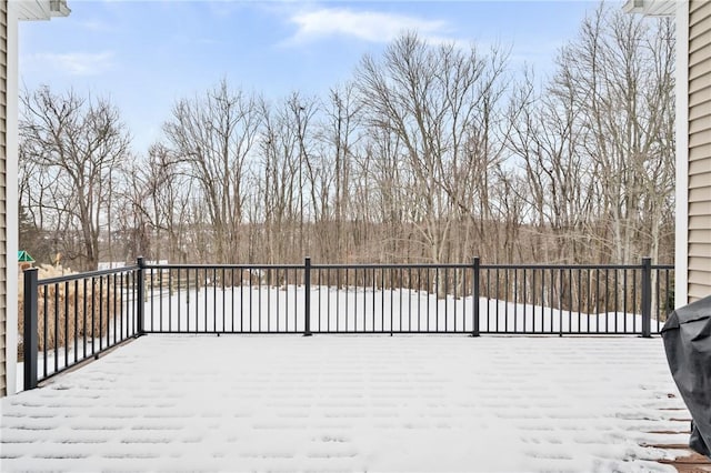 view of snow covered deck