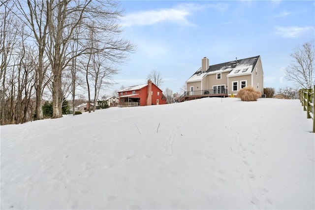 view of yard covered in snow