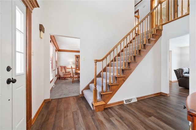 foyer featuring dark hardwood / wood-style floors