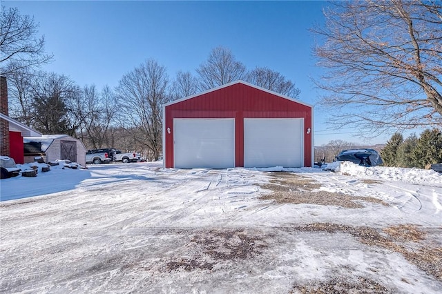 view of snow covered garage