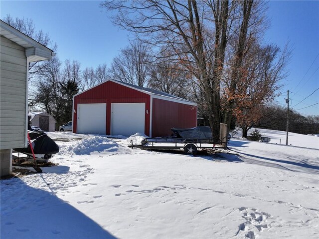 view of snow covered garage