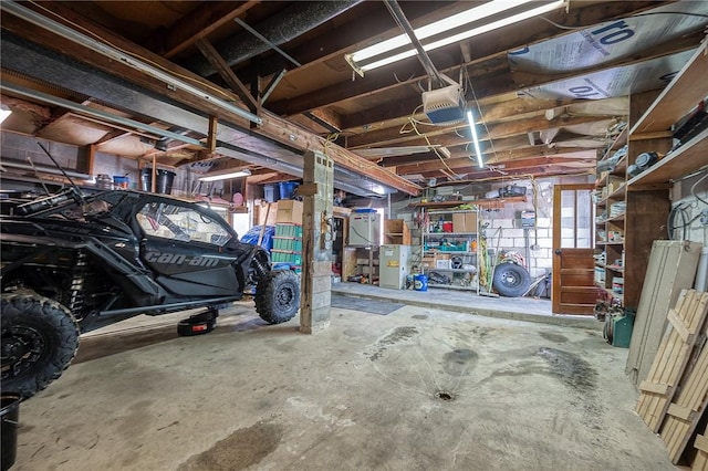 garage featuring a garage door opener