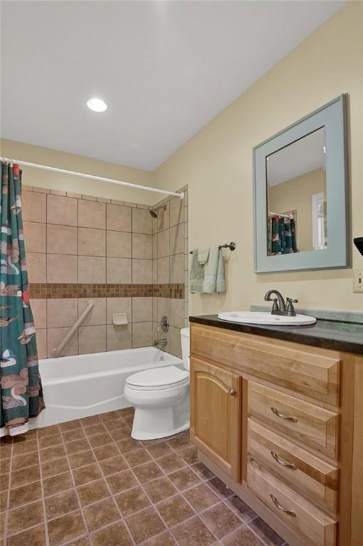 254 Light Ln, Cook Twp, PA 15658 - bathroom featuring vanity, shower / bathtub combination with curtain, tile patterned flooring, and recessed lighting