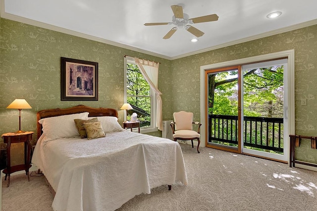 bedroom featuring ornamental molding, light colored carpet, access to exterior, and ceiling fan