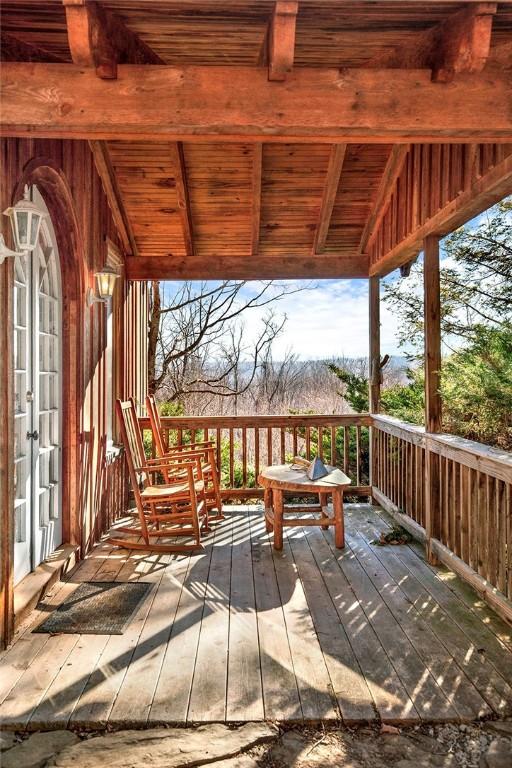 exterior space featuring a wooden deck