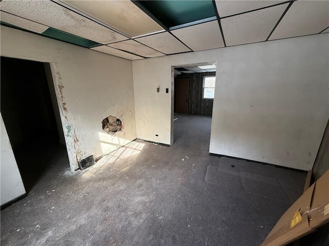 spare room with a drop ceiling
