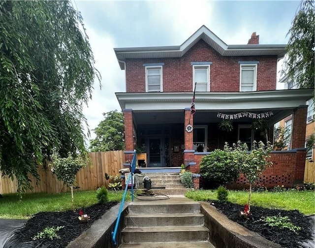 view of front of home featuring covered porch