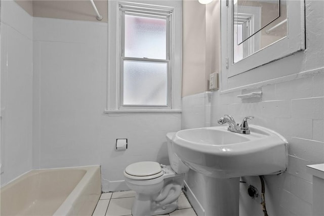 bathroom featuring shower / bath combination, tile patterned flooring, and toilet