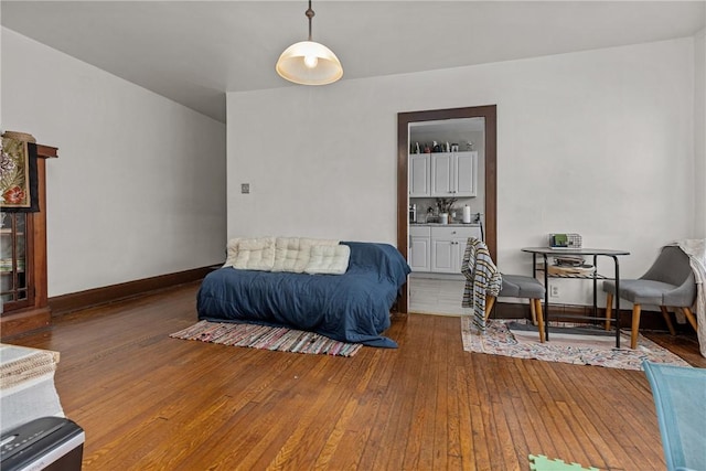 bedroom with hardwood / wood-style floors