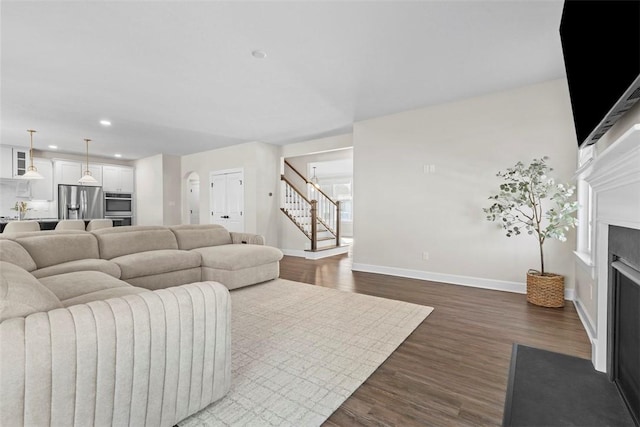 living room featuring dark hardwood / wood-style flooring