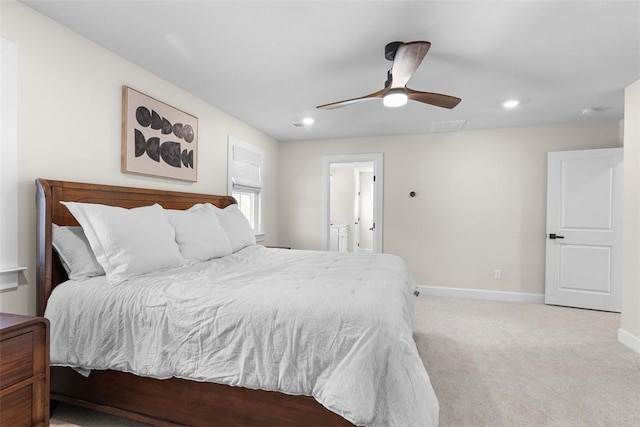 bedroom with light colored carpet and ceiling fan