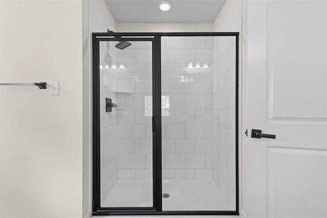 bathroom featuring an enclosed shower