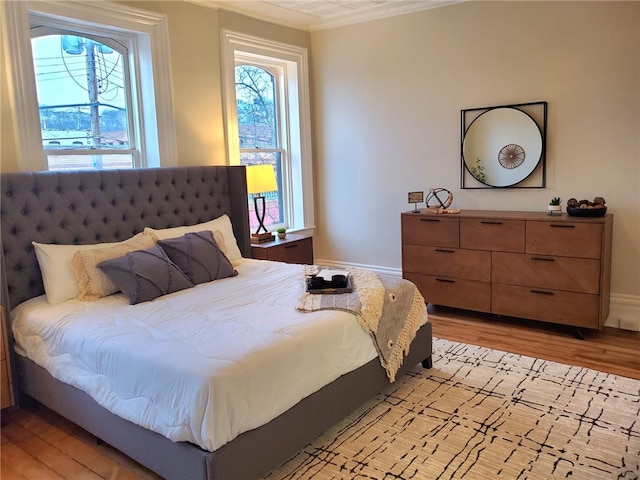 bedroom with light wood-type flooring