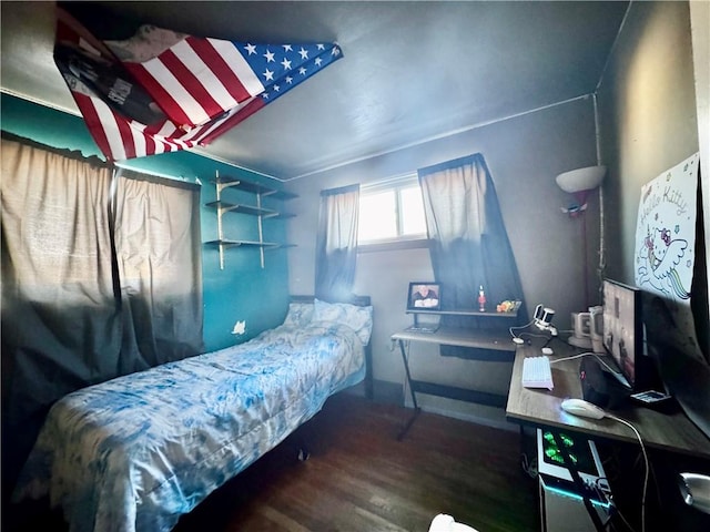 bedroom featuring hardwood / wood-style floors