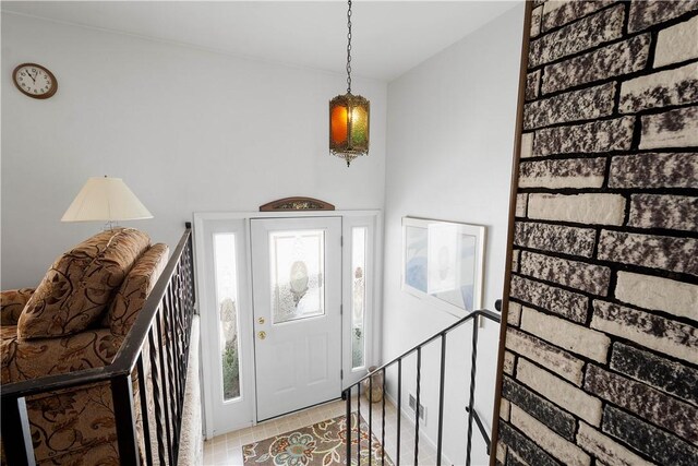 entrance foyer featuring light tile patterned floors