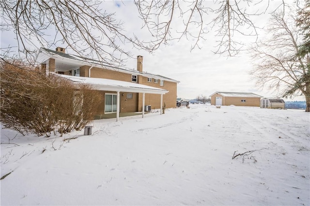 view of snow covered property