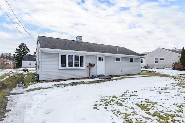 view of snow covered property