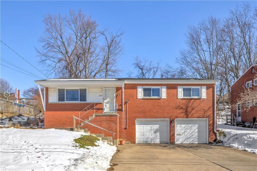 view of front of home with a garage