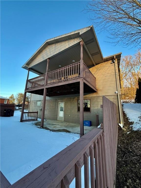 view of snow covered house