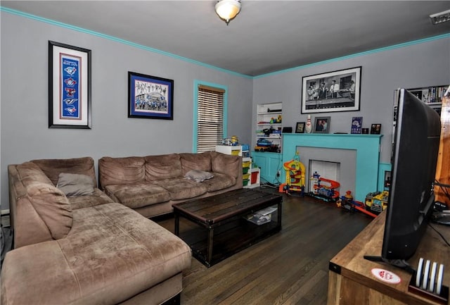 living room featuring ornamental molding and dark hardwood / wood-style floors