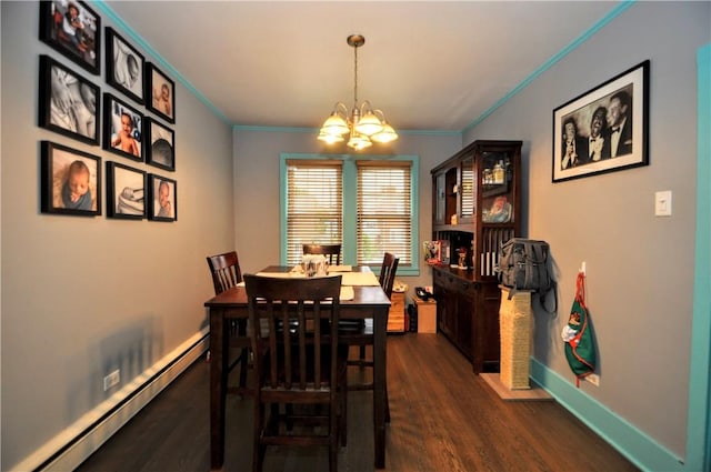 dining space featuring crown molding, a baseboard heating unit, dark wood-type flooring, and an inviting chandelier