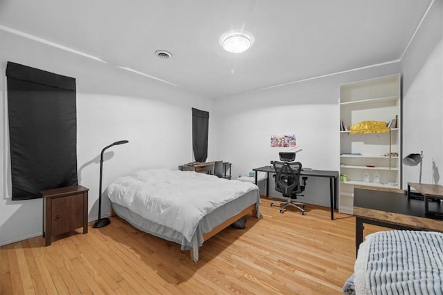 bedroom featuring light wood-type flooring