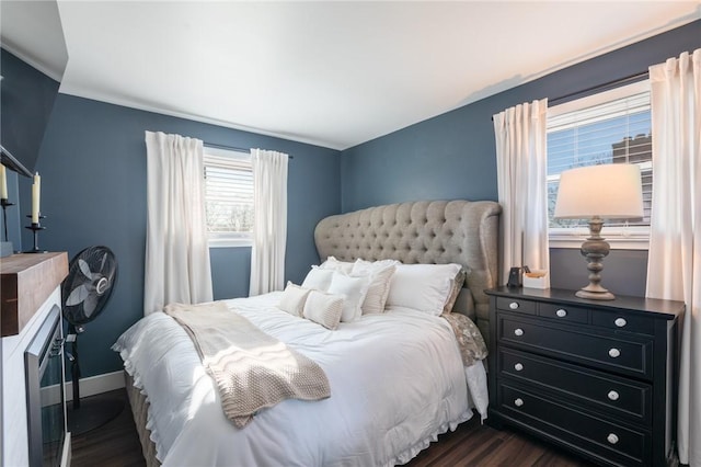 bedroom featuring dark hardwood / wood-style floors