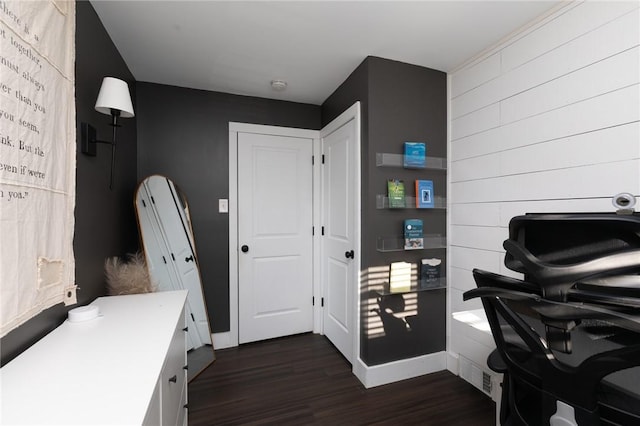 office with dark hardwood / wood-style floors