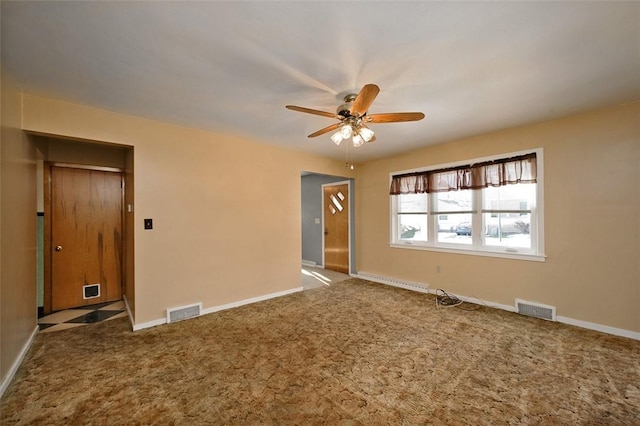 empty room with baseboard heating, ceiling fan, and carpet