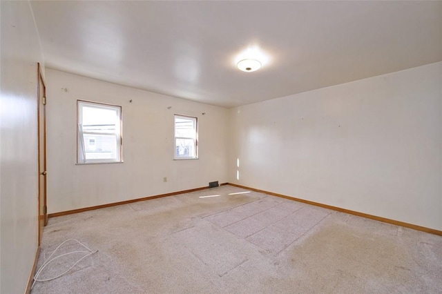 204 Liberty St, Perryopolis, PA 15473 - empty room with light colored carpet and baseboards