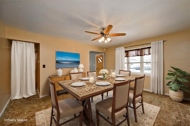 204 Liberty St, Perryopolis, PA 15473 - dining space with baseboards, ceiling fan, and carpet floors