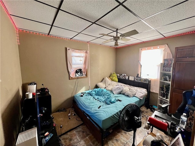 bedroom with a drop ceiling