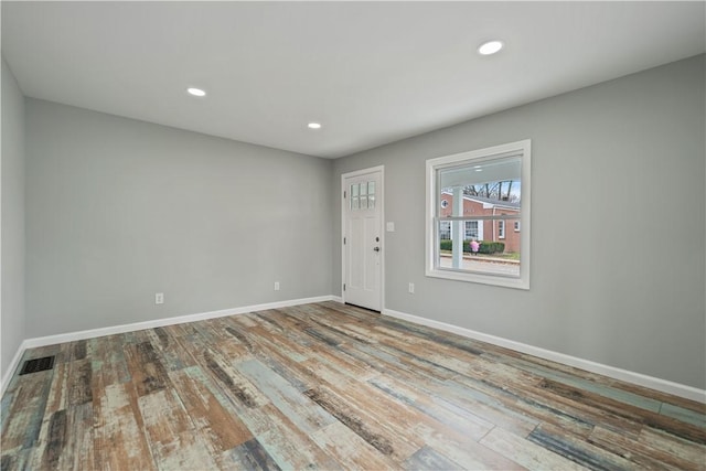 unfurnished room featuring light wood-type flooring