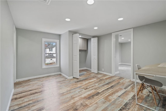 home office featuring light hardwood / wood-style floors