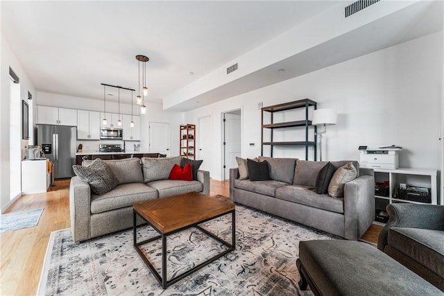 living room featuring light wood-type flooring