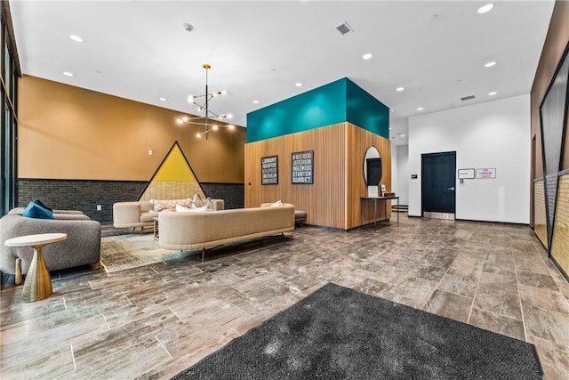 welcome area with an inviting chandelier