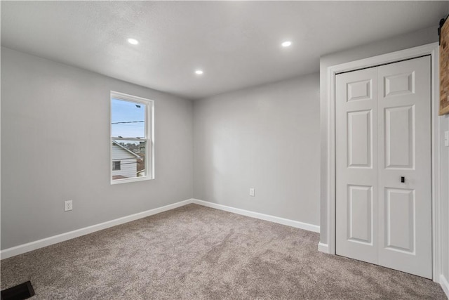 view of carpeted spare room