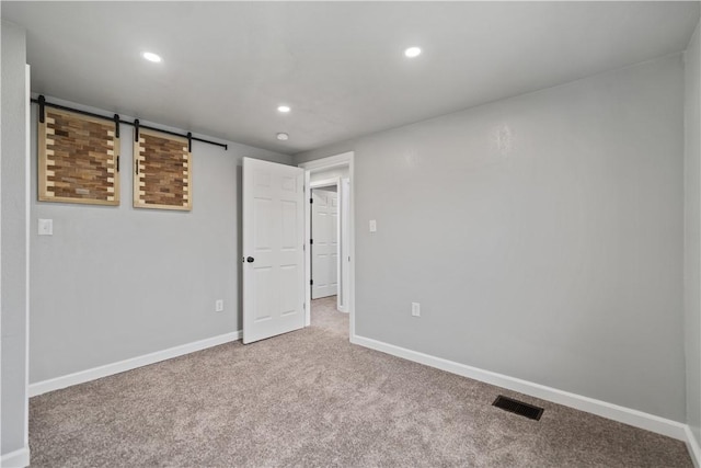 view of carpeted spare room