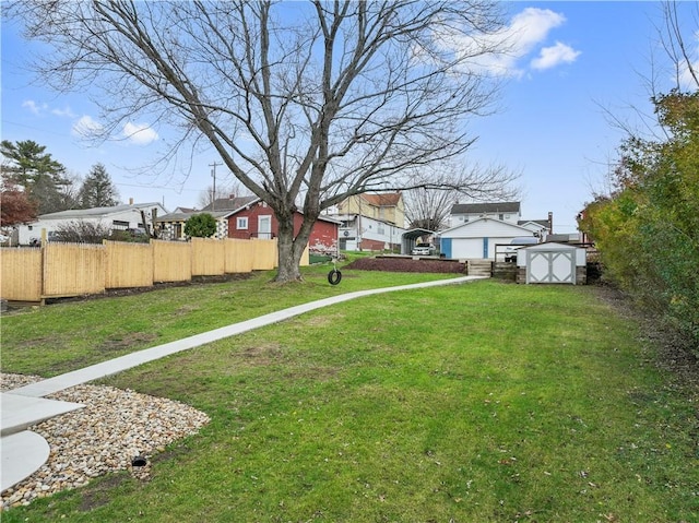 view of yard with a storage shed