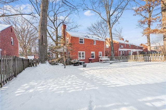 view of snow covered property