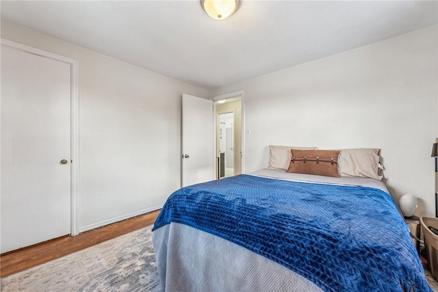 bedroom featuring hardwood / wood-style floors