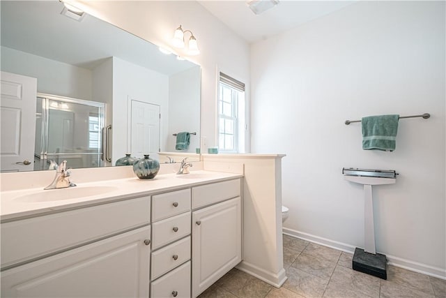 bathroom featuring walk in shower, vanity, and toilet