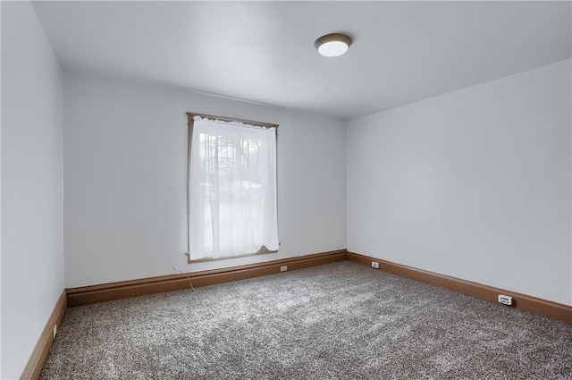 spare room with carpet flooring