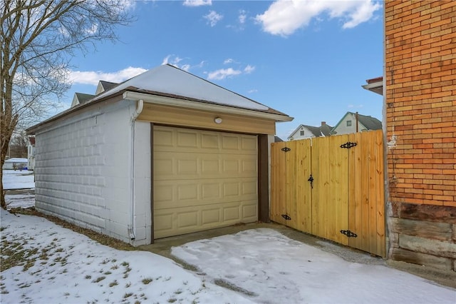 view of snow covered garage