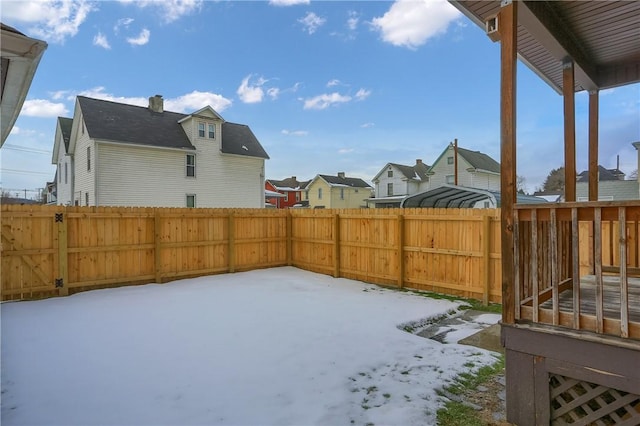 view of yard covered in snow