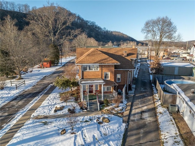 exterior space featuring a mountain view